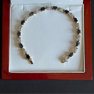 Elegant gold plated genuine Sapphire tennis Bracelet.
